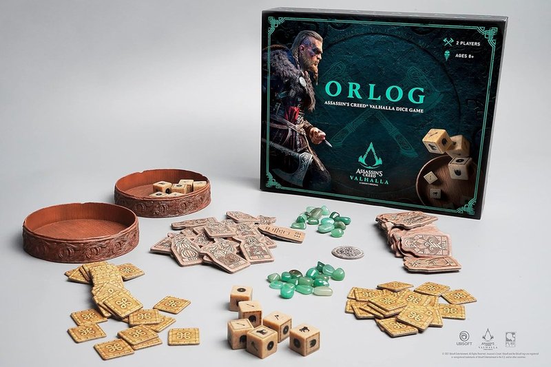 Assassin's Creed: Orlog — seis dados con símbolos vikingos, tres tiradas para configurarlos y los favores de los dioses que deciden el combate